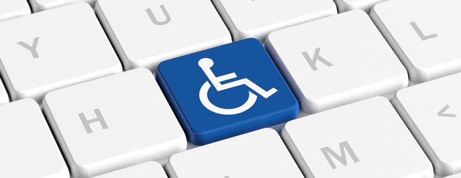 Das Bild zeigt eine Tastatur. Eine Taste bildet ein Rollstuhl-Icon ab.